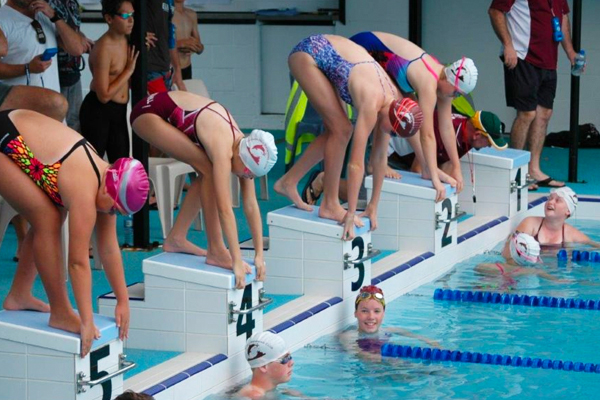Friday night at Cannon Hill Dolphins, kids racing under lights