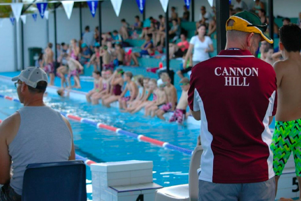 Parents helping as timekeepers at the pool